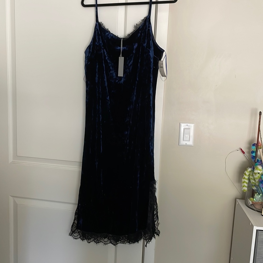 Chelsea28 blue velvet slip dress with slit detail.